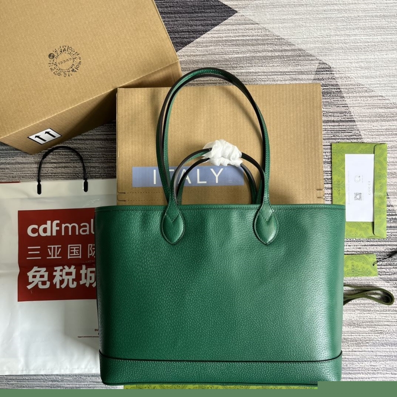 G*u*i shopping bags